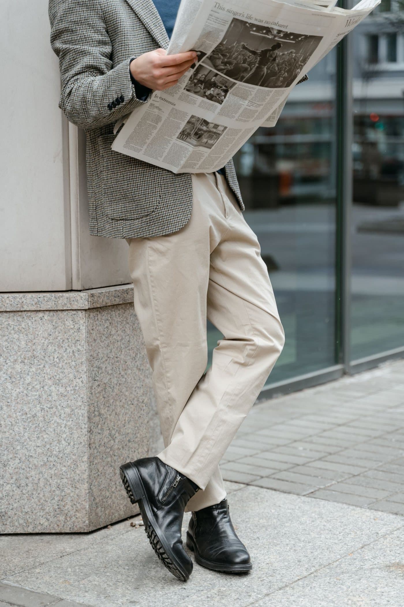 Cream wide-leg trousers worn with a jacket